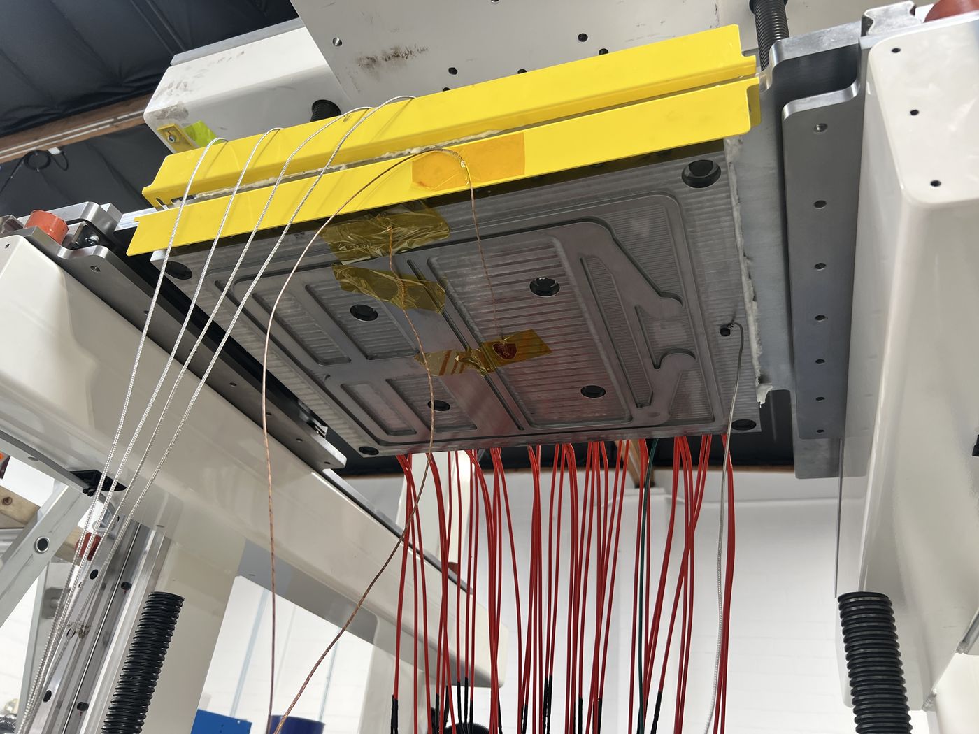 Underside of a hot plate, heaters and thermocouples wired in